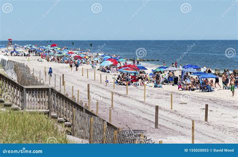 Ocean Beach Fire Island Is Crowded With People And Umbrellas Editorial
