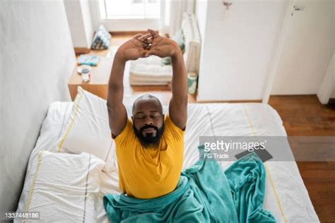 Black Man Sleeping In Bed Photos And Premium High Res Pictures Getty