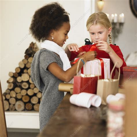 Girls Wrapping Christmas Presents Stock Image F0066580 Science