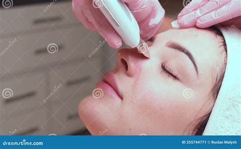 facial cleansing with ultrasound scrubber woman receiving ultrasound facial stock video video