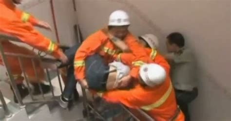 Terrifying Moment Suicide Jumper Is Caught Mid Air By Firefighters In China Video Huffpost