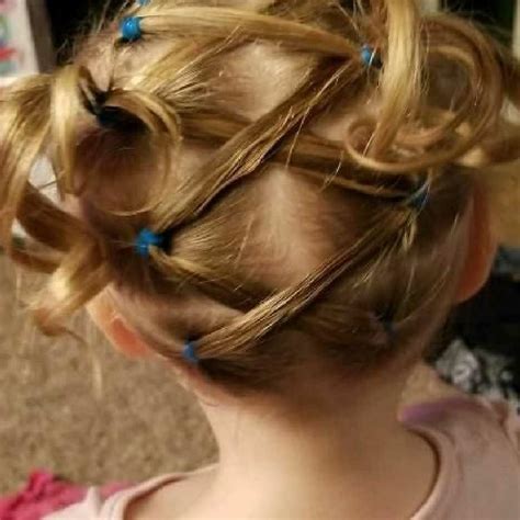 This cute little girl ponytail hairstyle is made through first braiding from one side and pinning it up and attaching a white flower. I love this for my 2 year old | Kids hairstyles, Hairstyle ...