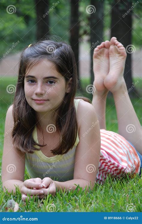 Beautiful Tween Girl Sitting Outside At School Stock Image