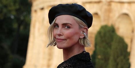 Charlize Theron Wore A Naked Dress In Rome And Her Entire Bod Is Pure