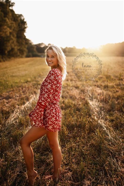 A Woman In A Red Dress Posing For A Photo With The Words Senior Girl Poses Creek Nature