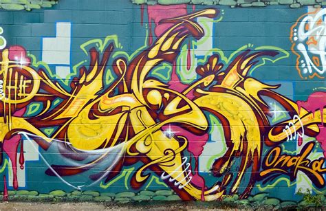 Our Blue And Yellow Graffiti Mural Wallpaper Is A Brilliant Mural That