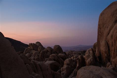 Free Stock Photo Of Smooth Rock Formations During Sunset In Joshua Tree