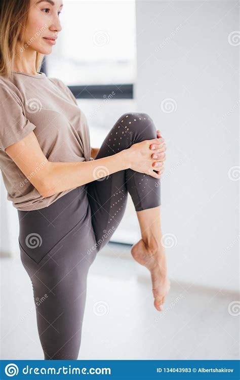 Woman Standing On One Leg With Bent Leg Stock Image Image Of