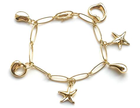 Tiffany And Co Charm Bracelet By Elsa Peretti In 18k Gold With Extra