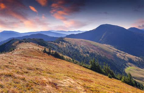 Colorful Autumn Sunrise In The Carpathian Mountains Stock Photo