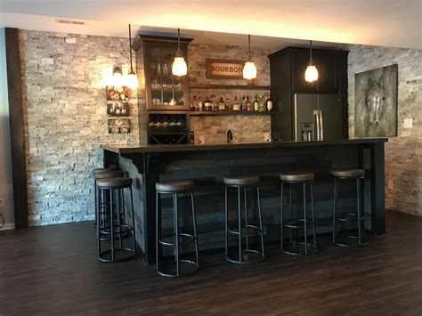 Basement Bar With Stone Backsplash And Dark Wood Rustic Basement Bar