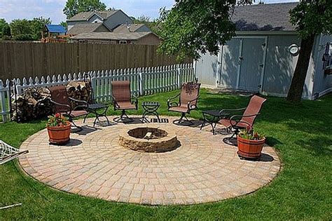 Burns either wood pack or traditional firewood. DIY Patio with Fire Pit | The Owner-Builder Network