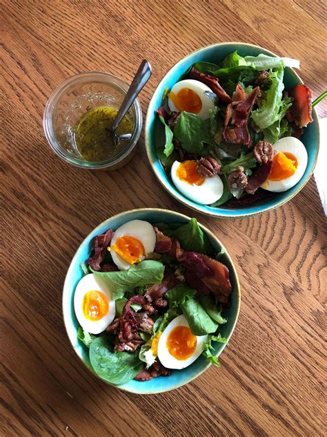 Spinach Salad With Soft Boiled Eggs Bacon And A Mustard Vinaigrette