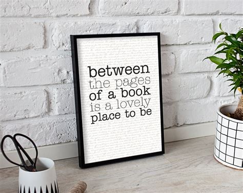 between the pages of a book is a lovely place to be poster