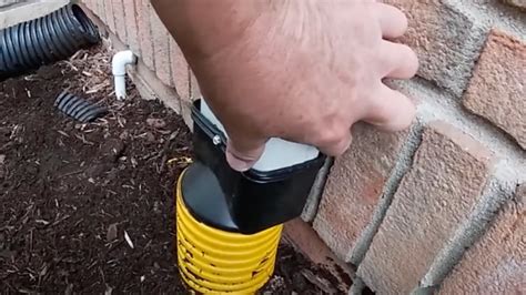 How To Bury Gutter Downspouts Under A Driveway