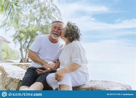 Happy Asian Senior Retired Couple, Relax Smiling Elder Man And Woman Enjoying With Retired 