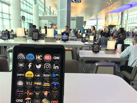This Airport Terminal Has Hundreds Of Public Tablets Attached To Tables