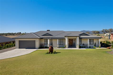 Woodland Grey Colorbond Roof And Rendered Single Builders Home In