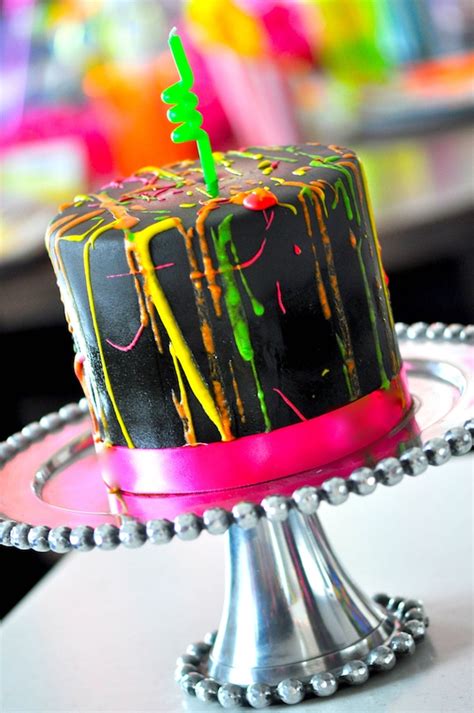 Neon glow party cupcake wrappers with picks. Regulae: Sweet 16 Neon Party Decorations