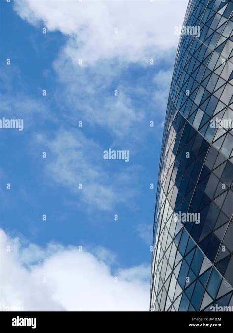 Gherkin Detail With Blue Sky And Clouds London City United Kingdom
