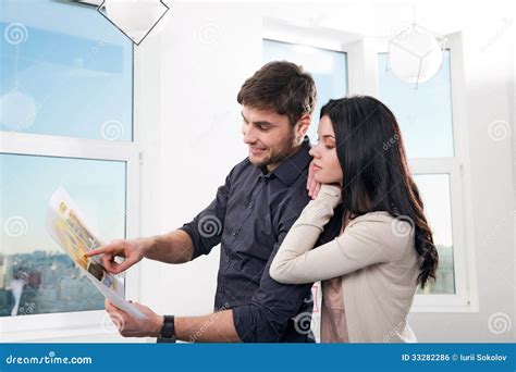 Couple in Searching the Real Estate for a Purchase Stock Photo - Image
