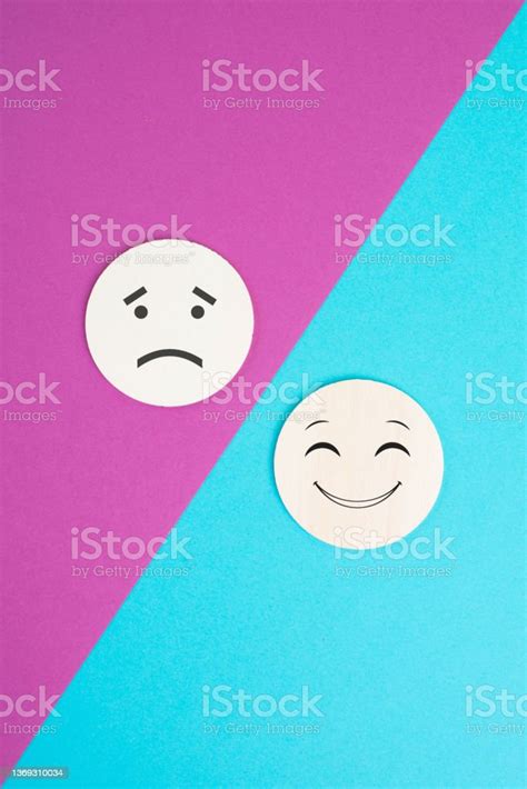 Two Wooden Faces One Is Sad The Other One Is Smiling Positive And