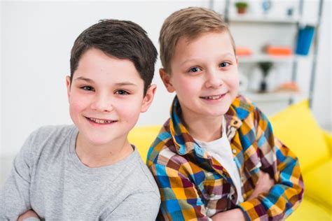 Free Photo Portrait Of Two Boys At Home