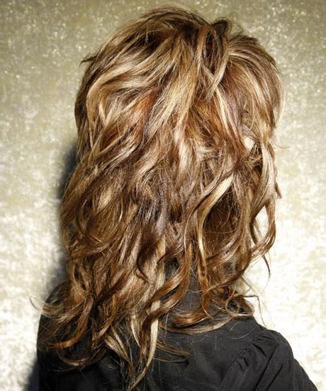 Rochlin / wireimage / getty images. Long layered curly hairstyles