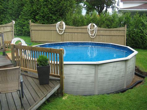 We are planning to rebuild the deck next year to connect to the new pool, but for the time being at least(and who knows if what i have planned for the deck will actually happen), what will be something good to put around the pool? Evolution 21 ft Round Above Ground P | Pool Supplies Canada