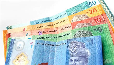 The ringgit was then pegged to the us dollar at us$1.00=rm3.8010 in the effort to stabilise the ringgit currency since september 2, 1998. Royalty Free Malaysian Ringgit Pictures, Images and Stock ...