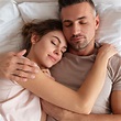 Top view of pretty loving couple sleeping together in bed | The Veranda