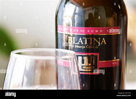 Wine Glasses In The Tasting Room Bottle Of Blatina Vrhunsko Suho Vino