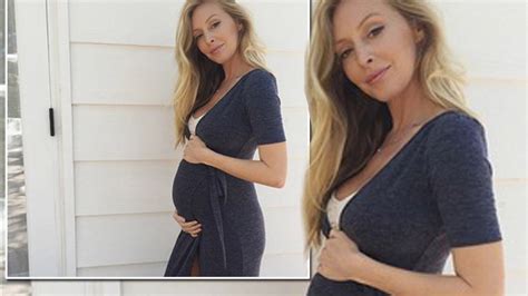 Pregnant Leah Jenner Is Glowing As She Cradles Her Growing Baby Bump