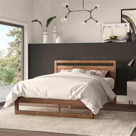 The hugo upholstered platform bed showcases a button tufted headboard and solid rubberwood round legs. Ellerbe Mid-Century Modern Platform Bed & Reviews | AllModern