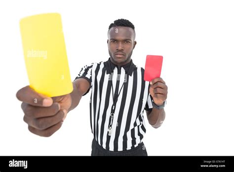 Serious Referee Showing Yellow And Red Card Stock Photo Alamy