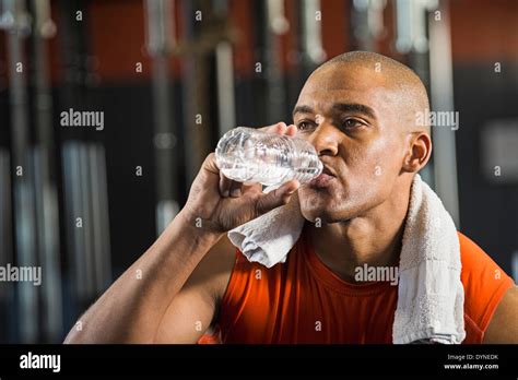 Black Man Drinking Water In Gym Stock Photo Alamy