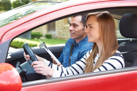 Woman Having Driving Lesson With Instructor - Hickory Driving School
