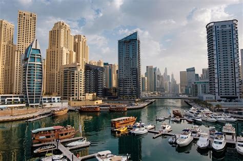 Premium Photo Dubai Marina With Boats And Buildings United Arab Emirates