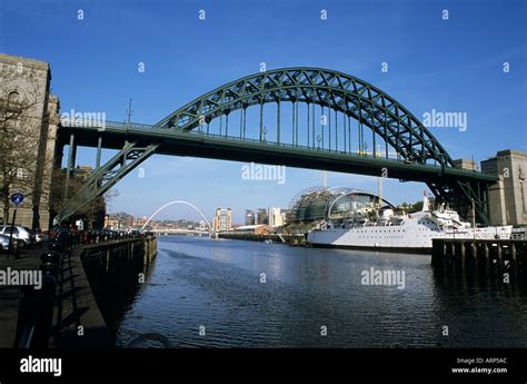 Tyne Bridge Near And Gateshead Millennium Bridge Far Over The River