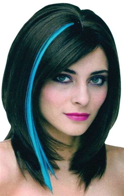 For blue back hair, a dark black hue with a hint of blue is not only mysterious but very flattering. black hair with neon blue highlights - Di Candia Fashion
