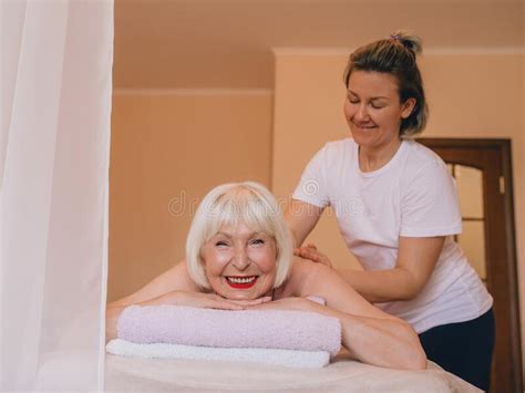 Elderly Old Caucasian Stylish Woman With Gray Hair Laying On A Massage Stock Image Image Of