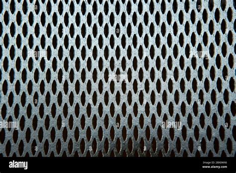 The Texture And Pattern Of Perforated Metal Stock Photo Alamy