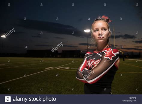 Portrait Serious Tough Teenage Girl High School Cheerleader With Arms