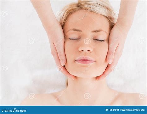 Relaxed Blond Haired Woman Getting A Massage Stock Photo Image Of