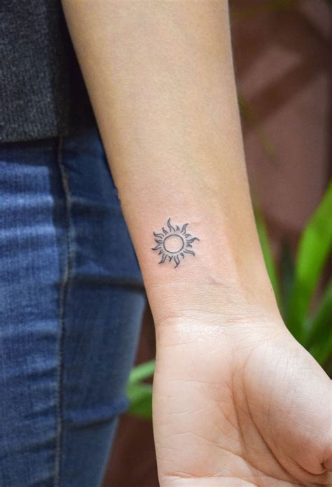 Swirly Line Drawn Sun Tattoo Freshly Inked At Our Friendly And