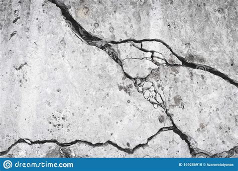 Ruined Concrete Wall Crack And Hole In The Cement Slab Grunge Surface