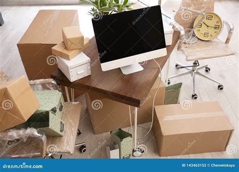 Moving Boxes And Furniture In Office Stock Photo Image Of Cardboard