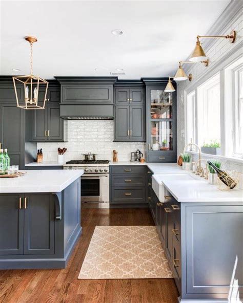 Carved painted inlaid with gold or minimalistic flat panels are some of the varieties of dark wood style cabinetry you ll see in this. 20 Fabulous Kitchens Featuring Grey Kitchen Cabinets | The Happy Housie