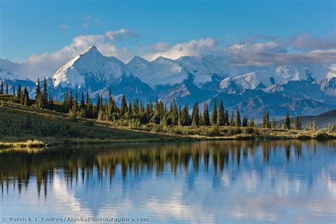 Alaska Range Mountains Including Mt Brooks Reflect In The Still