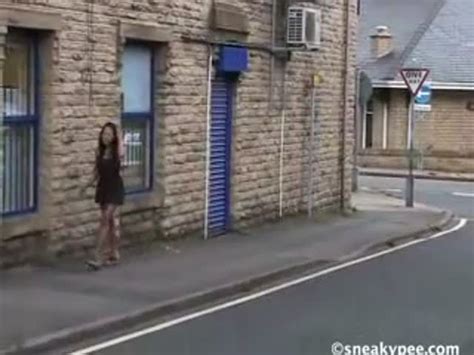 Dark Haired Girl Peeing Outdoor
